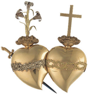 Les deux cœurs votifs offerts par Madame Élisabeth.